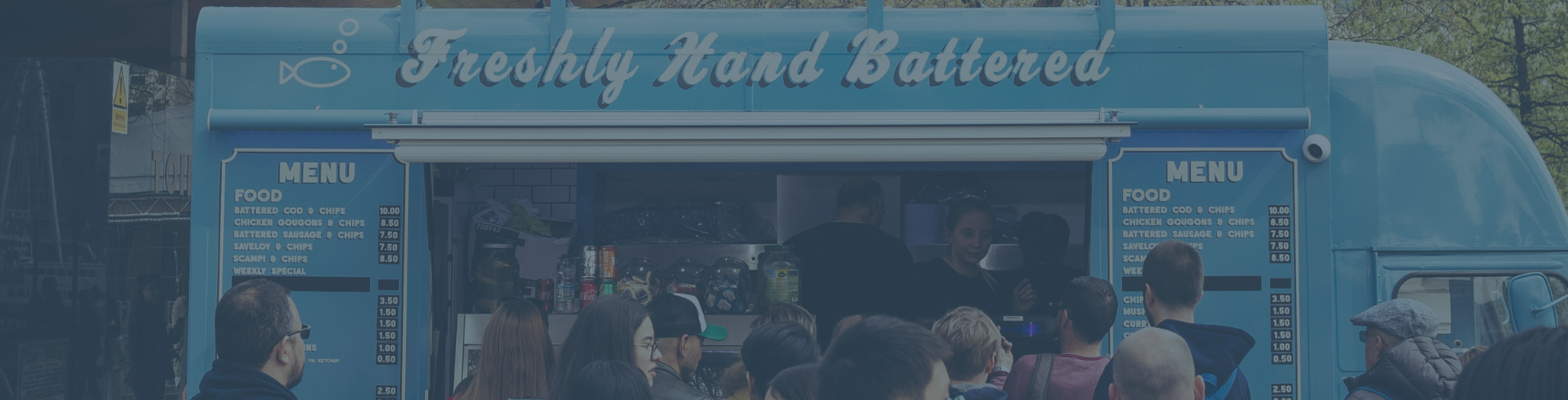 people-standing-in-front-of-food-truck